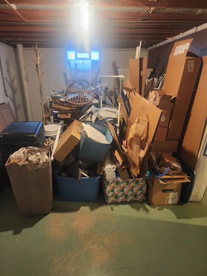 Roll-off dumpster container at job site for Yard Waste Dumpster Rental in Middlesex